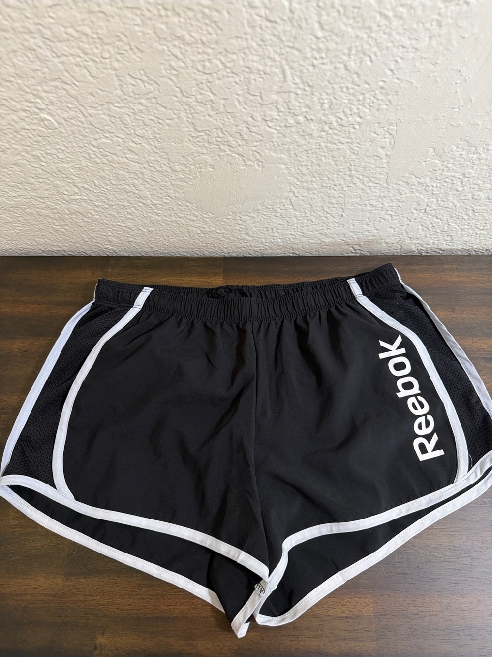 Reebok Black Shorts with White Trim and Side Logo